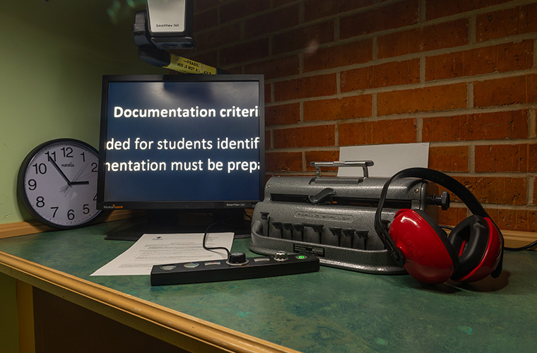 Accommodation tools offered by UL Lafayette Disability Services including headphones, alternative testing location, and a brail typewriter.